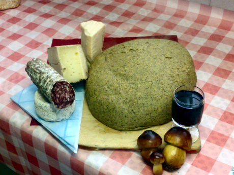 Polenta con formaggi e salame